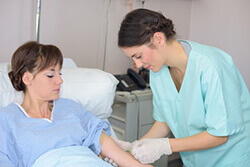 Krankenschwester mit Patient